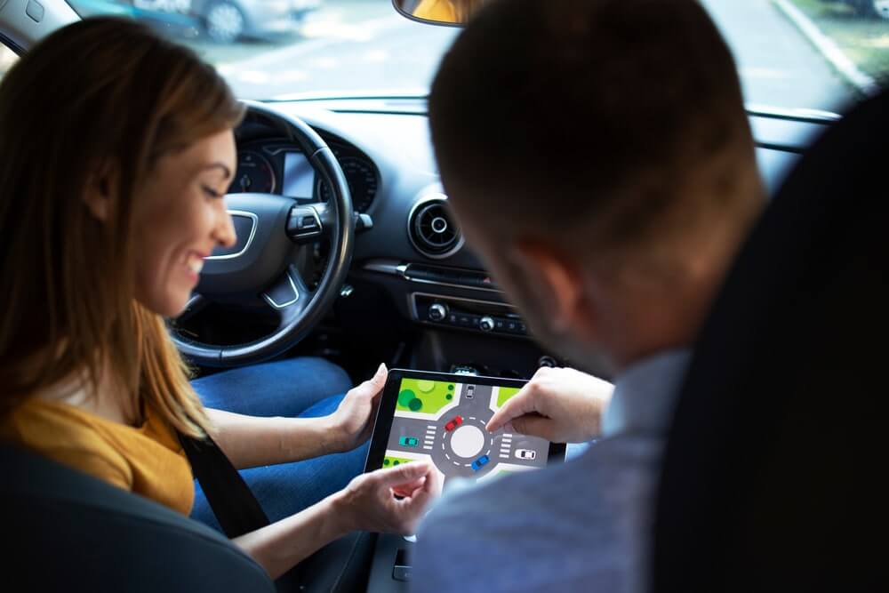 Car Instructor Teaching About Uncontrolled Intersection Rules in Alberta